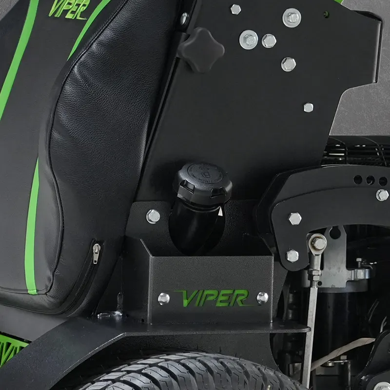 A black Viper-branded machine component with bolts and a fuel cap sits above a treaded tire, with green accent stripes on the left panel.